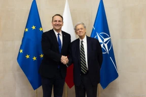 «Важные дела». Министр иностранных дел Польши встретился с Джоном Коулом